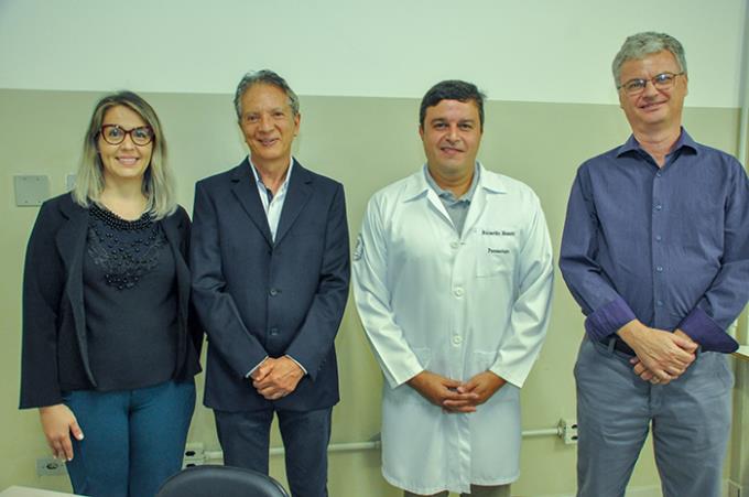 Denise com o Dr. Carneiro e os avaliadores doutores Beneti e Moliterno